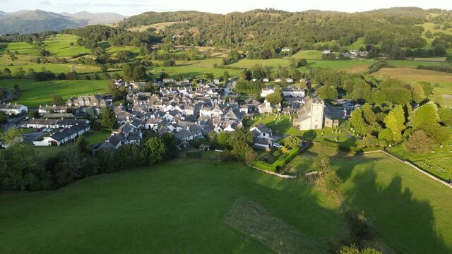 Hawkshead village Lake District Cumbria UK Aerial footage pull back reveal 4K
