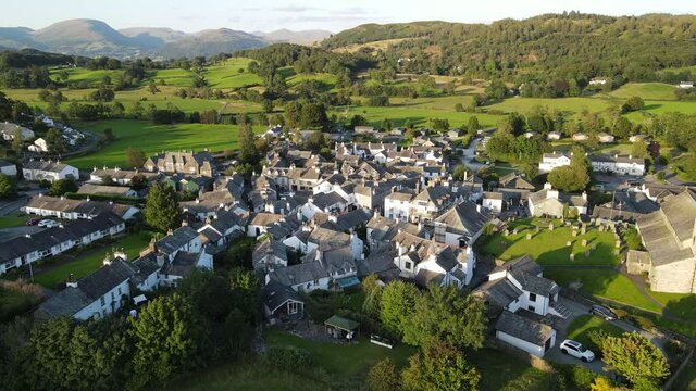 Hawkshead village Lake District Cumbria UK Aerial footage 4K sunset