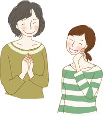 向かい合って話す若い女性と年配の女性。
