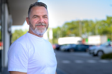 Fototapeta premium Confident attractive athletic senior man with beard