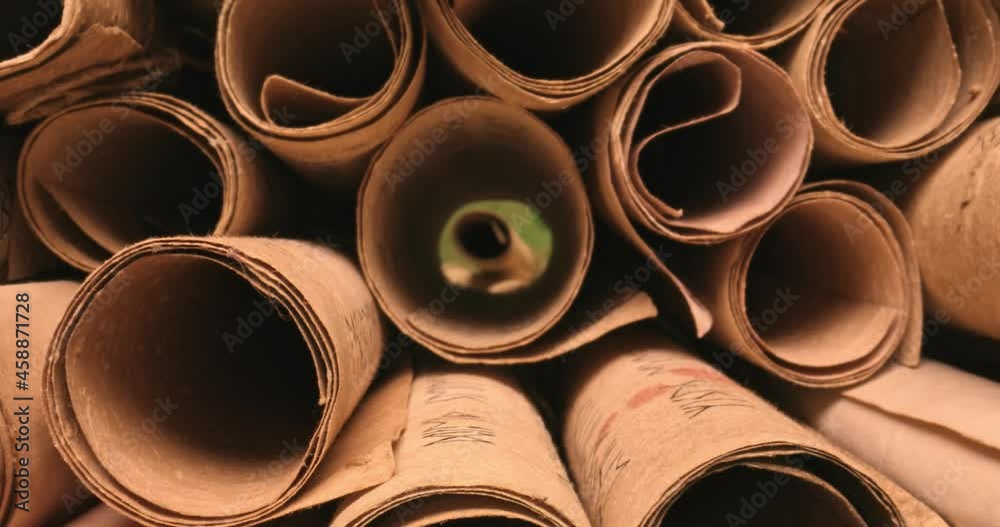 Poster Old scroll library. Inside view from scrolls stacked on pile.