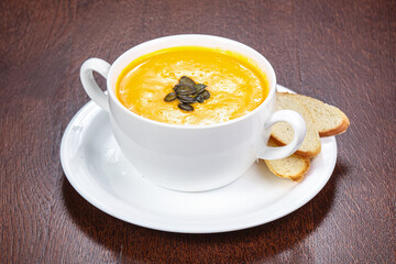 Tasty pumpkin soup with seeds