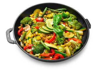 Frying pan with different vegetables on white background
