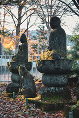 Ancient stone Buddha statue at pagoda