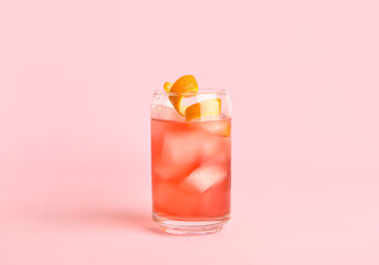 Glass of tasty Negroni cocktail on color background