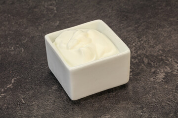 Sour cream in the bowl