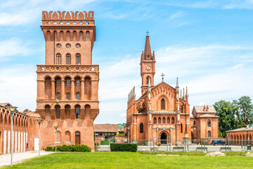 Fototapeta premium View at the Medieval tower and Church of San Vittore in Pollenzo, Italy