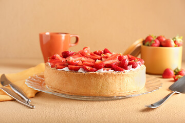 Plate with sweet strawberry pie on table