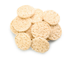 Pile of puffed corn crackers on white background