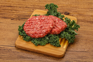 Raw beef burger cutlet for cooking