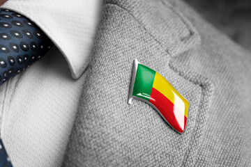Metal badge with the flag of Benin on a suit lapel