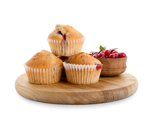 Wooden board with tasty cranberry muffins on white background