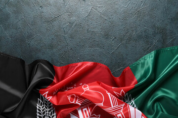 National Afghanistan flag on black background, closeup