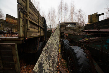Fototapeta na wymiar rusty and disassembled abandoned cars