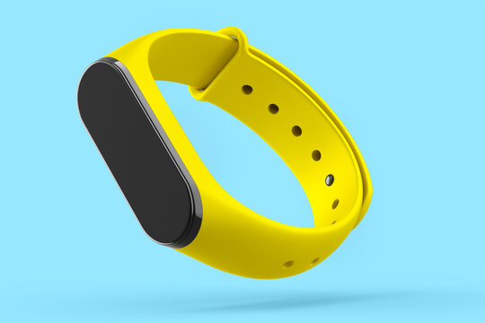 Yellow fitness tracker or smart watch with heart rate monitor isolated on blue