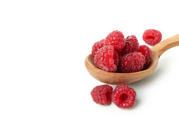 Wooden spoon with raspberries, isolated on white background