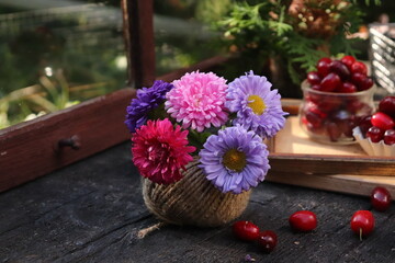 flowers in a basket, ball of string