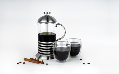 French press with two glasses, coffee, cinnamon isolated on white
