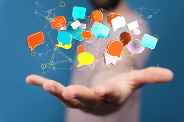 Hand holding using mobile phone with email icon on screen. Concept of business communication