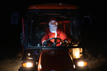 Santa Claus driving his red modern vehicle