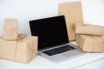 Cardboard boxes on your keyboard laptop, shopping.