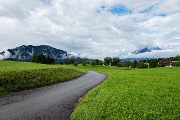 Fototapeta na wymiar Beautiful mountains landscape in Switzerland Alps. Winding road