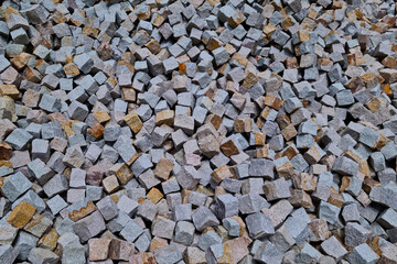 Texture of small decorative stones for building a path or fence, background.