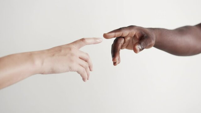Two Diverse Hands Reaching Out to Each Other Close-up. Concept Interracial Closeness Relation Couple of People. Female and Male Trying Touching Arm. Mixed Multi Ethnic Sign Creation Adam in Hands 4k