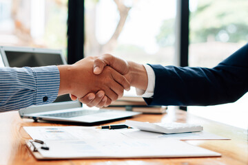 Business partnership meeting concept. Image businessmans handshake. Successful businessmen handshaking after good deal.