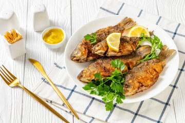 fried crucian carps with golden crispy crust