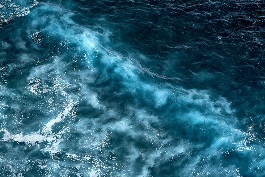 Aerial view to seething waves with foam. Waves of the sea meet each other during high tide and low tide © Dmitry Yakovtsev