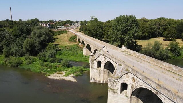 Aerial view of Nineteenth-century bridge over the Yantra River, known as the Kolyu Ficheto Bridge in Byala, Ruse region, Bulgaria