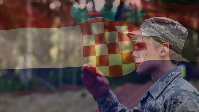Animation of flag of croatia over soldier