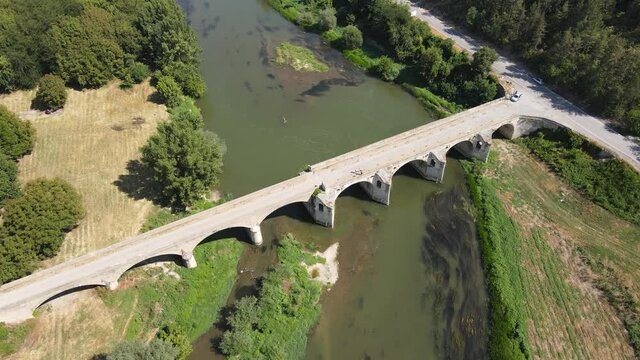 Aerial view of Nineteenth-century bridge over the Yantra River, known as the Kolyu Ficheto Bridge in Byala, Ruse region, Bulgaria
