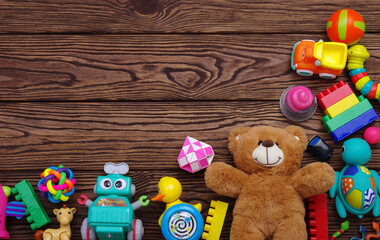 Toys colored and top view with copy space on wood
