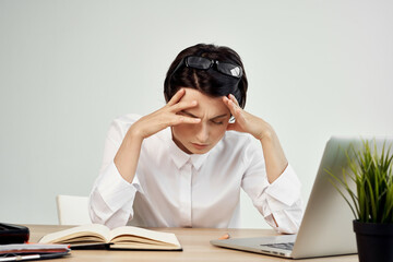 Businesswoman at the desk with glasses self-confidence Studio Lifestyle