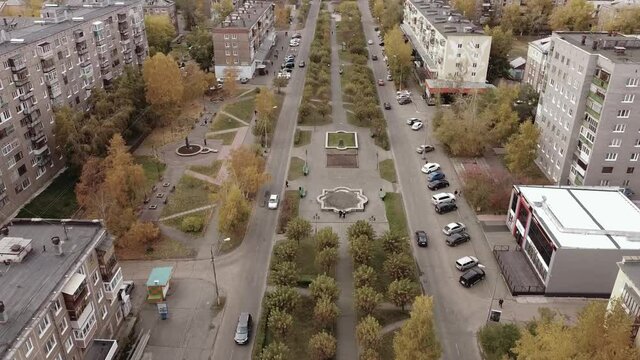 Aerial dolly in downtown industrial city of Bratsk in Russia in Autumn