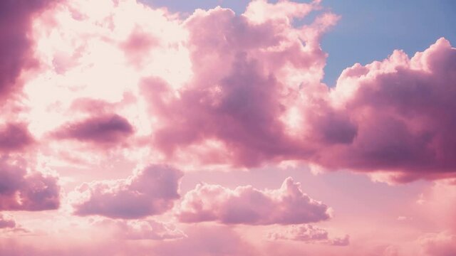 Light Cloudy Pink And Blue Sky With Fluffy Clouds. Natural Background 4K Time Lapse. Toned Sky Backdrop