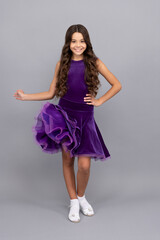 beautiful happy child with long curly hair in dance ballroom dress full length, junior