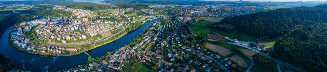 Fototapeta na wymiar Aerial view of the city Neuhausen in Switzerland on a sunny morning day in summer 