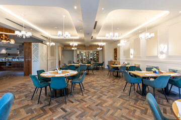 Interior of a luxury restaurant with wooden wine shelf