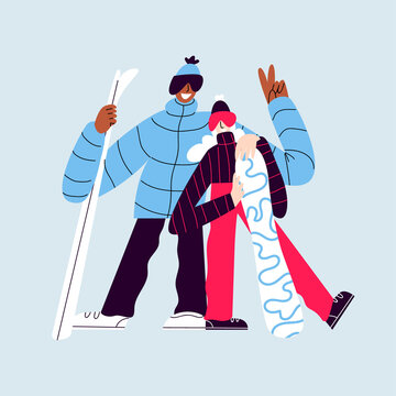 Happy skiers isolated. Woman and man in warm clothes with skis and snowboard. Smiling people in ski suits posing for a photo on a blue background.