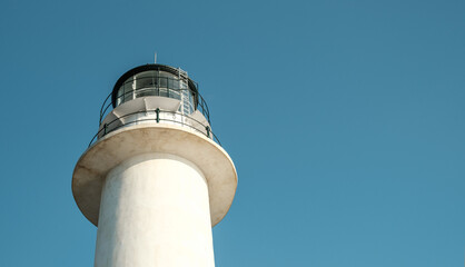 Low angle view at white lighthouse 