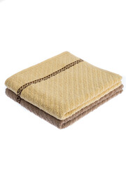 folded colored towels on white background