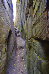 Narrow cracked streets in the megaliths of the Stone Town. The Kamenny Gorod tract.