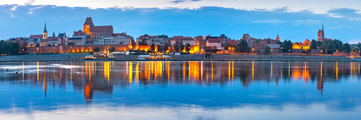 Evening panorama of Old Town of Torun seen from the Vistula, Poland