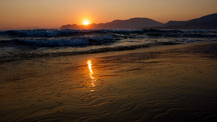 Spawning place of Caretta Caretta turtles: Iztuzu beach. Golden sun rays reflecting off the sea at...