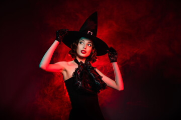 Photo of seductive creepy mystic lady wear black dress arms hands gothic headwear looking empty...