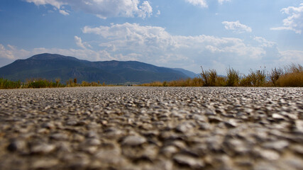 Obraz premium Highway stretching across the steppe. Deserted highway.