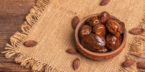 Sun-dried olives in a ceramic bowl